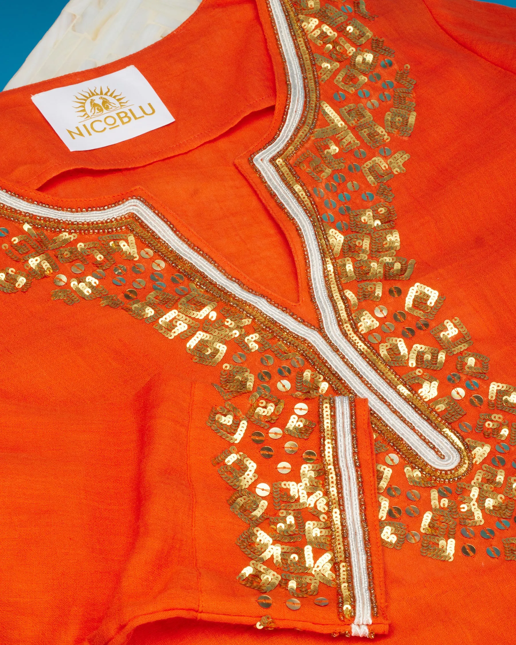 Alba Tunic in Coral Orange and Embellishment